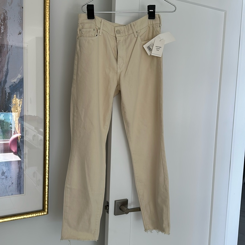 Great mother boyfriend jeans. Pale creme color. 
Never worn tags on!